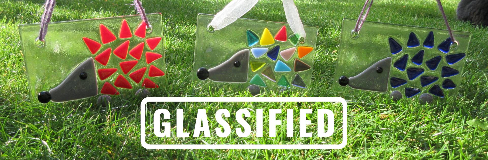 Website banner: Glassified logo with three fused glass hedgehogs